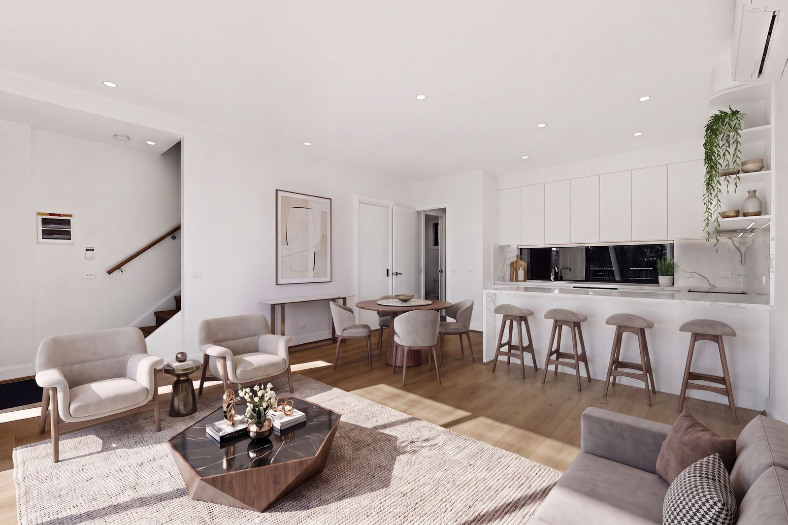 Virtual Staging Before and After 24 The same open plan room seen from the opposite end toward the kitchen island, with the identical sofa, rug and artwork